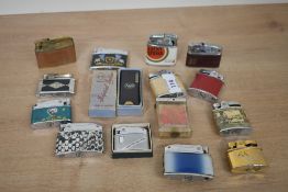 A quantity of 20th-century clipper lighters, to include an Evans pocket petrol lighter featuring