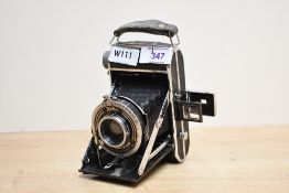 A Welta Perle folding camera circa 1935 with Carl Zeiss Jena Teessar 1:4,5 7.5cm lens and folding
