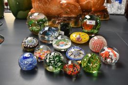 A selection of 20th-century studio glass paperweights, to feature a selection of Murano-style
