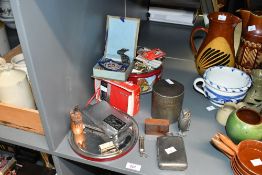 A small collection of advertising match boxes and books housed in a circular biscuit tin and sold