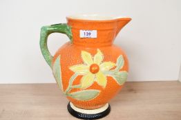 An early 20th-century Art Deco Clarice Cliff 'Bizarre' Nuage Dragon pottery jug; featuring a