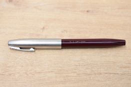A Sheaffer Imperial II fountain pen in burgundy with brushed steel cap (engraved)