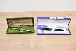 Two boxed Waterman Fountain pens a Waterman Expert in Black and a Waterman CF in chrome with gold