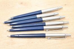 Six Parker Jotter ballpoint pens in blue