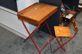 A set of vintage wood and red metal Triang child's folding school desk and chair, marked to front,