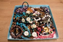 An assortment of costume jewellery, including a semi-precious stone bracelet, statement pieces and