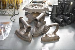 A selection of late 19th-century cast iron ware, to include three flat irons; a large J.Ashcroft and