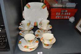 A 1930's Alfred Meakin Art Deco design part tea set, the conical cups with angular handles and