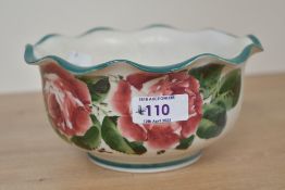 A 19th-century Scottish Wemyss Ware pottery bowl, having a scalloped edge with delicate cabbage rose