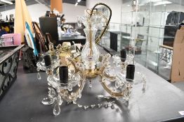 A late 20th-century Italian Maria Theresa-style crystal cut glass chandelier, featuring five