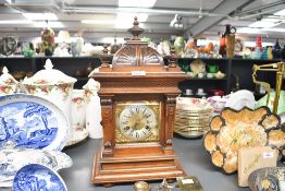 A fine late 19th-century German Gebr Junghans Uhrenfabrik walnut cased mantel clock, having a