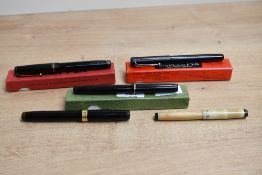 Five Mabie Todd & Co Swan fountain pens. A boxed Swan L200 60 twist fill, a boxed Swan 1060 twist