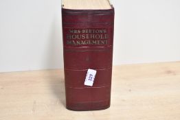 A large early 20th-century cloth bond copy of 'Mrs Beeton's Book of Household Management'
