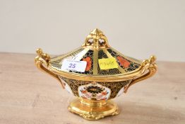 A late 20th-century Royal Crown Derby bone china 'Old Imari, Pattern 1128' sauce tureen, having twin