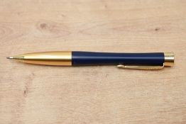 A Parker Urban ballpoint pen in Matte blue with gold trim