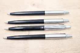 Four Parker Jotter ballpoint pens in black