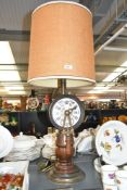 A tall 20th-century reproduction Baldwin-Brocket ships telegraph mounted as a table lamp,
