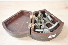 A 20th-century Stanley of London brass Pocket Sextant, in a wooden hinged lid case, approximately
