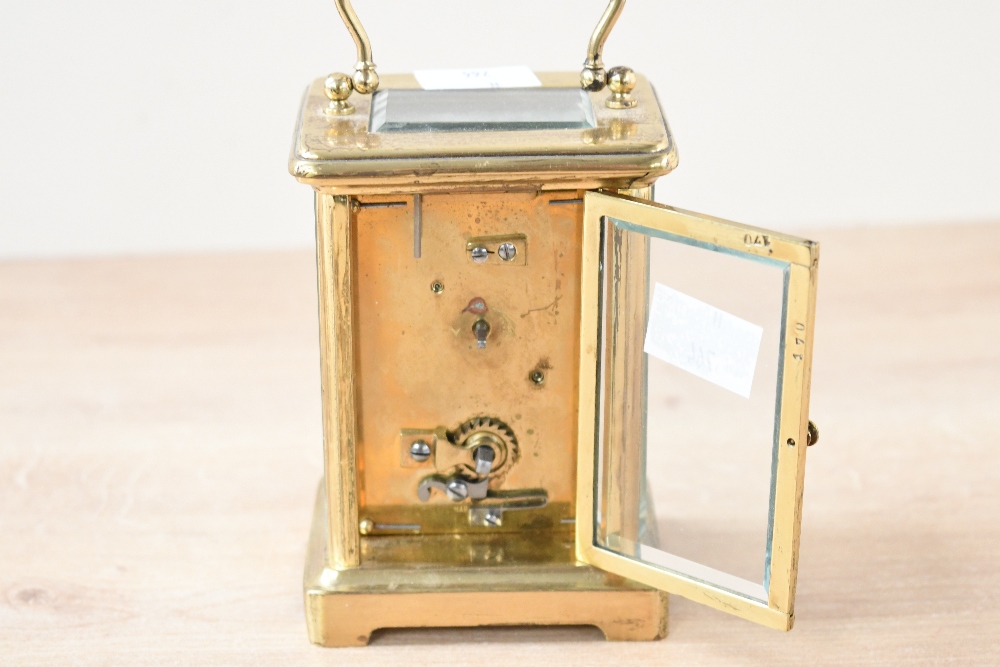 A late 19th to early 20th-century French brass 5 glass carriage clock, featuring glass panels and - Image 2 of 4