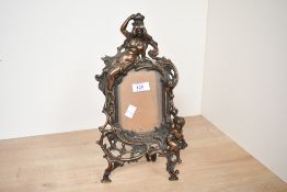 An early 20th-century cast iron Art Nouveau 'Beatrice' picture frame, featuring ornate scrolled leaf