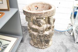 Of ethnographic interest, a large early to mid 20th-century Balinese hand-carved tree trunk planter,