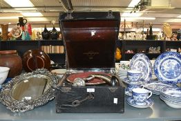 An early 20th century Columbia number 113 cased gramophone, with retailers label for N.G Napier &