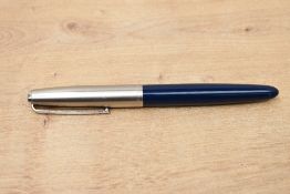 A Parker 21 aerometric fill fountain pen in dark blue with lustraloy cap