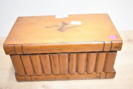 An early 20th-century olive wood puzzle jewellery box, having a secret lock and compartment