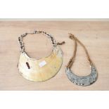 Of ethnographic interest, two 20th-century Papua New Guinea tribal art abalone shell necklaces, both