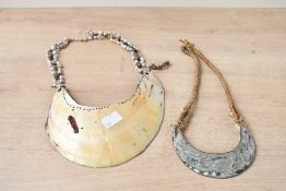 Of ethnographic interest, two 20th-century Papua New Guinea tribal art abalone shell necklaces, both