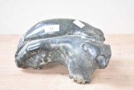 Thought to be 20th-century Canadian Inuit-style hardstone handcarving of a seal and polar bear,