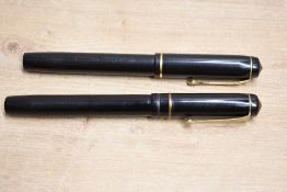 Two Conway Stewart 286 lever fill fountain pens in Black with single narrow cap band having Conway