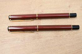 Two Parker Rialto converter fill fountain pens in Metallic Maroon