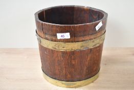 A 19th-century coopered oak peat/coal bucket, unmarked, 21cm in height and 23cm diameter,