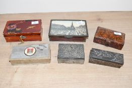 A selection of small 20th-century wood, metal and leather boxes, to feature two Oriental-style meta