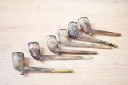 A selection of presumed 19th-century clay tobacco pipes, to feature a Dublin example and a