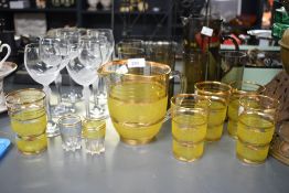 A 1960's/70's smoked glass lemonade set in the manner of Caithness, the tall cylindrical pitcher