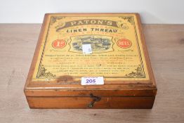 A 20th-century Paton's 3-cord linen wooden thread box, having a hinged lid, clasp close and interior