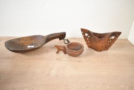 Of ethnographic interest, two 20th-century Papua New Guinea wooden ceremonial drinking cups, to