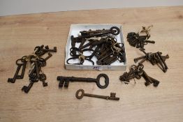 A selection of 19th to early 20th-century metal keys, of varying shapes and styles, (1 box full),