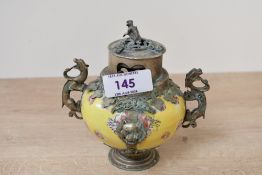 Thought to be 19th-century Chinese-style ceramic and white metal incense burner, the lid topped with