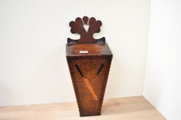 An 18th-century English Georgian mahogany cutlery box with lid, of sarcophagus-form with an ornate