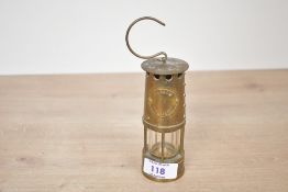 Of local interest, a small late 19th to early 20th-century 'Cambrian'-style brass miners safety