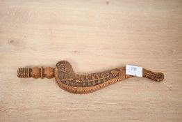 A fine late 19th-century hand carved wooden goose wing knitting stick, to feature a delicately