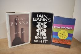 Literature. Iain Banks. Three titles. Dead Air. 2002, first edition. Signed. With; Whit. 1995, first