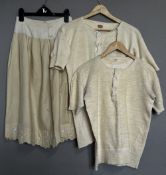 Three 20th century vintage wool garments with local interest, to include a Cumbrian wool hand worked