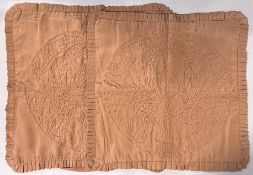 A pair of 20th century vintage Trapunto quilted cushion covers in blush terracotta crepe,
