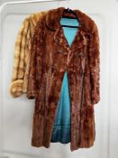 Two early 20th century fur coats, comprising a Richard Payne 3/4 length rust red squirrel hide