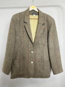A Dressage by Paul Costelloe tweed jacket in khaki flecked Pure New Wool herringbone, size M, in