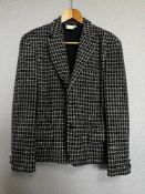 A 1980s vintage Comme Des Garcons oversides blazer jacket in black and white tweed Dupplin or double